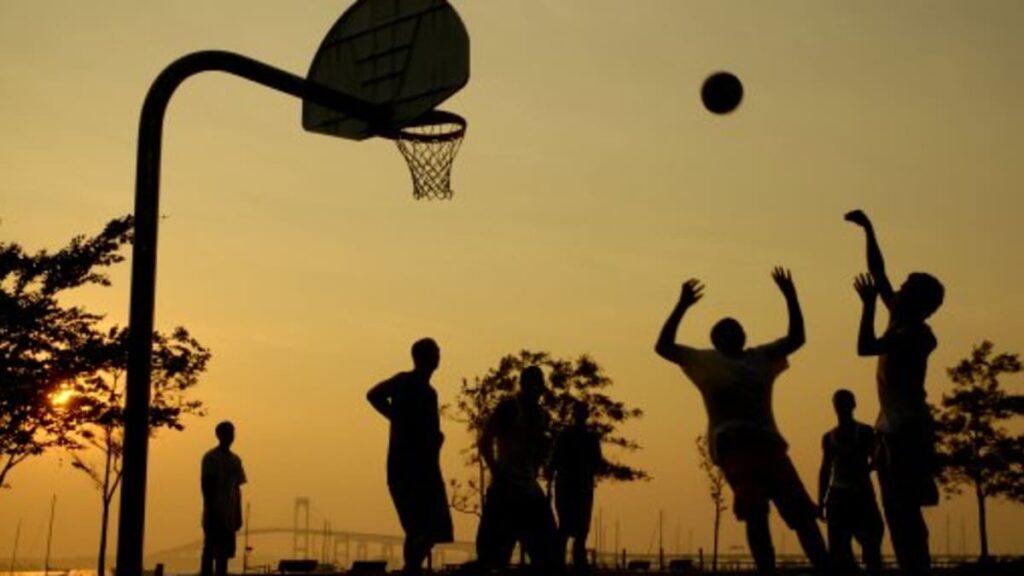 He plays basketball with his friends.